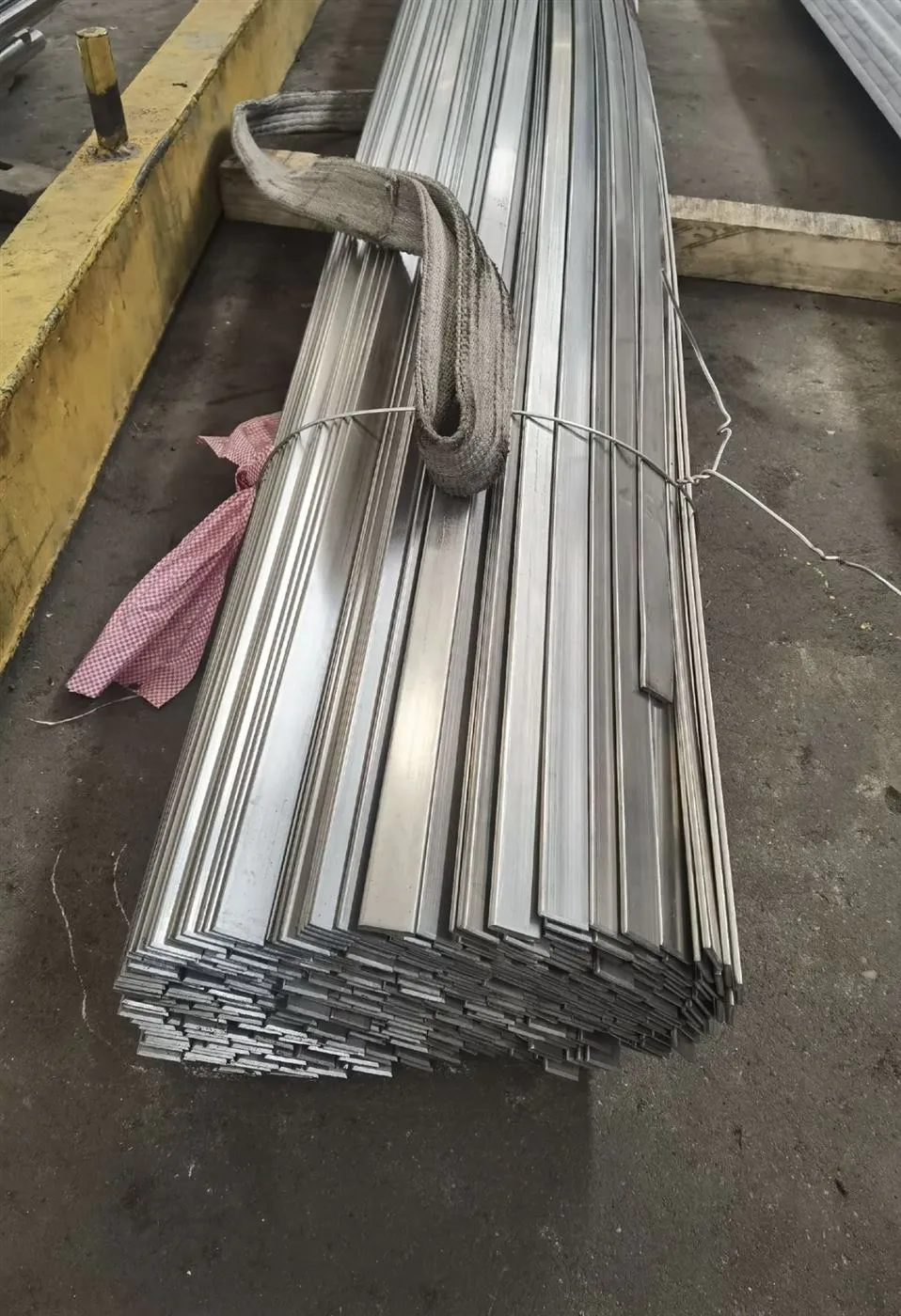 Cold drawn flat steel bar bundles in factory stock